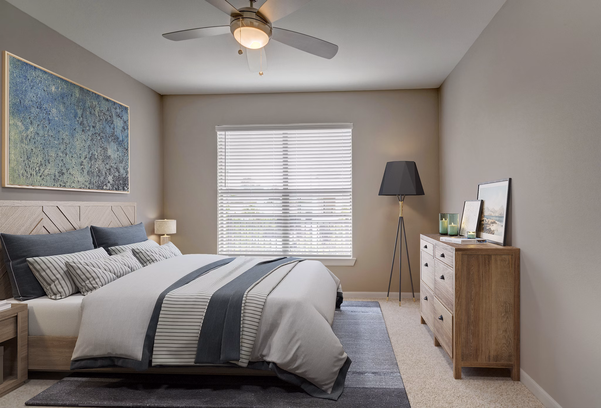 Cozy bedroom with modern decor at Boardwalk at Town Center Apartments, featuring a plush bed and ambient lighting for a relaxing atmosphere