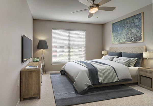 Elegant bedroom with modern dÃ©cor at Boardwalk at Town Center Apartments, offering luxury living in a serene setting