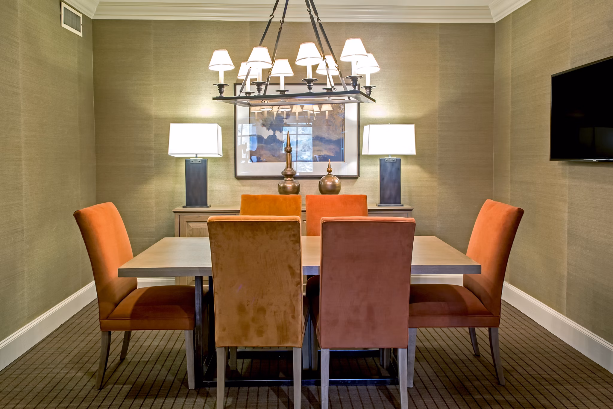 Modern clubhouse with stylish seating at Boardwalk at Town Center Apartments