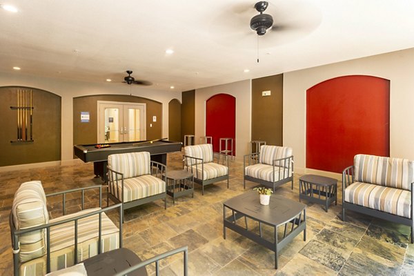 Clubhouse featuring modern design and seating at Boardwalk at Town Center Apartments