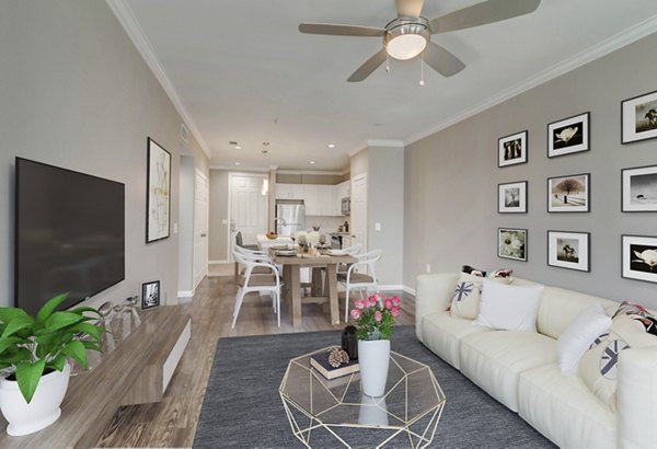 Spacious living room with modern decor in Boardwalk at Town Center Apartments