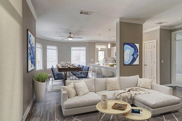 Cozy living room with stylish furnishings at Boardwalk at Town Center Apartments