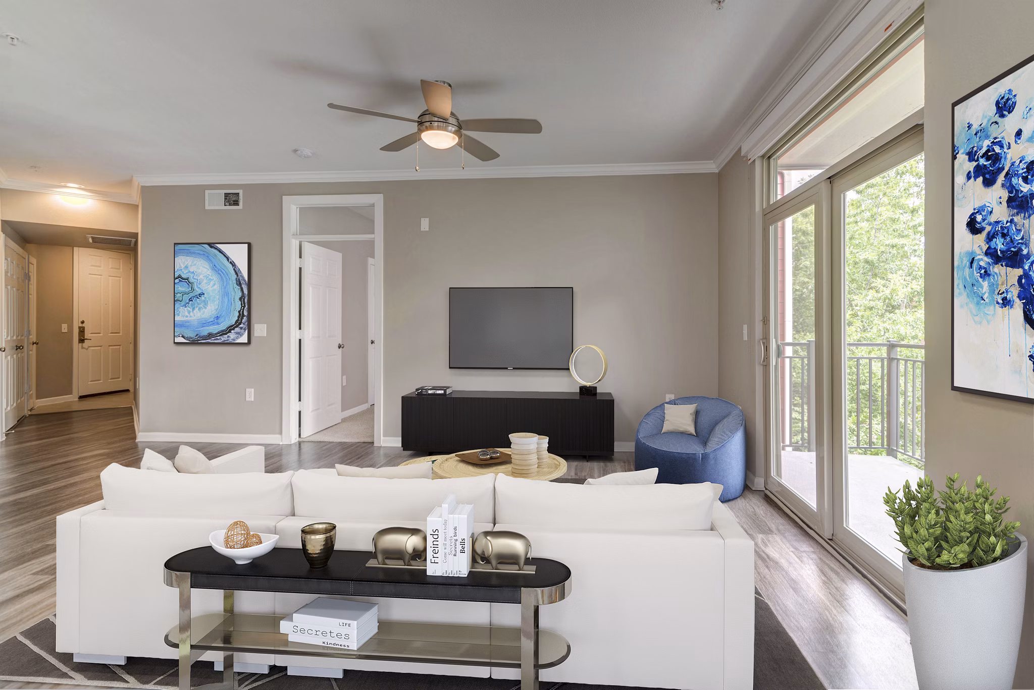 Modern living room with stylish decor at Boardwalk at Town Center Apartments in The Woodlands