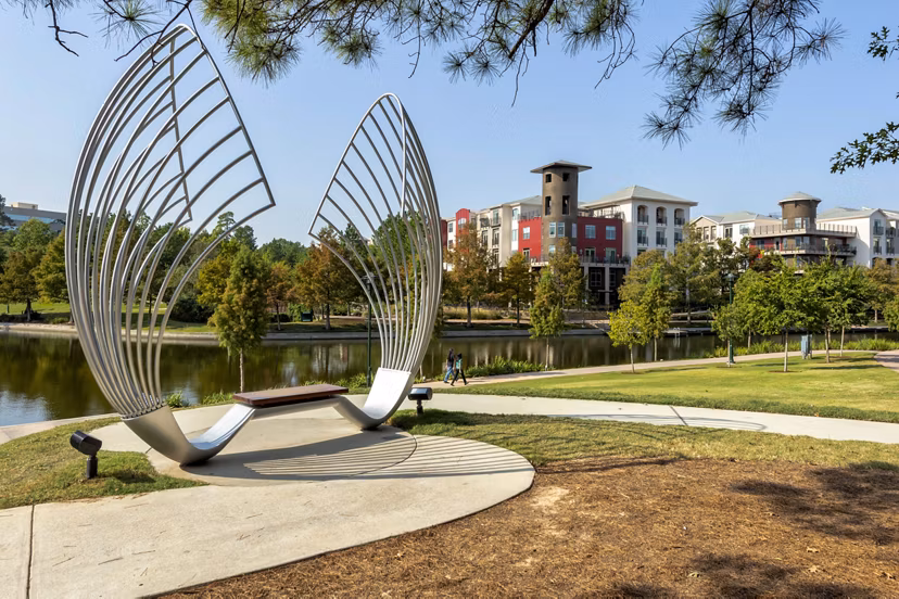 Boardwalk at Town Center: Lush green spaces and walking paths in vibrant neighborhood setting