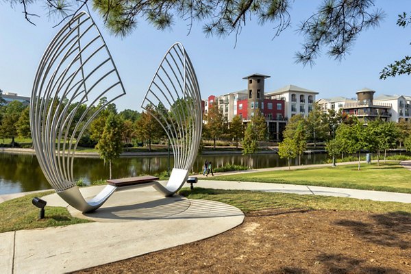 Boardwalk at Town Center: Lush green spaces and walking paths in vibrant neighborhood setting