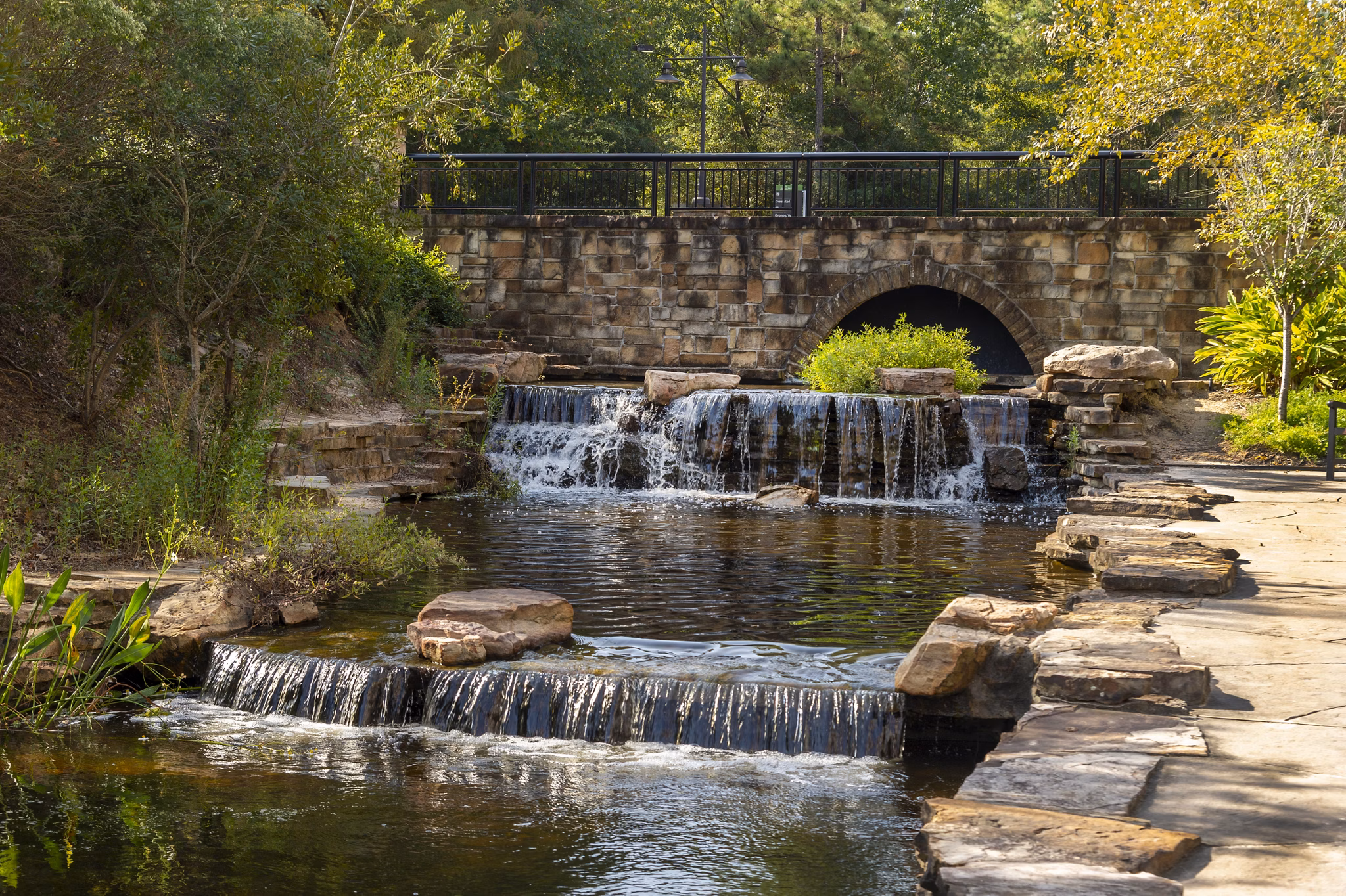 Neighborhood park near Boardwalk at Town Center Apartments with walking paths and green spaces, ideal for outdoor activities and relaxation