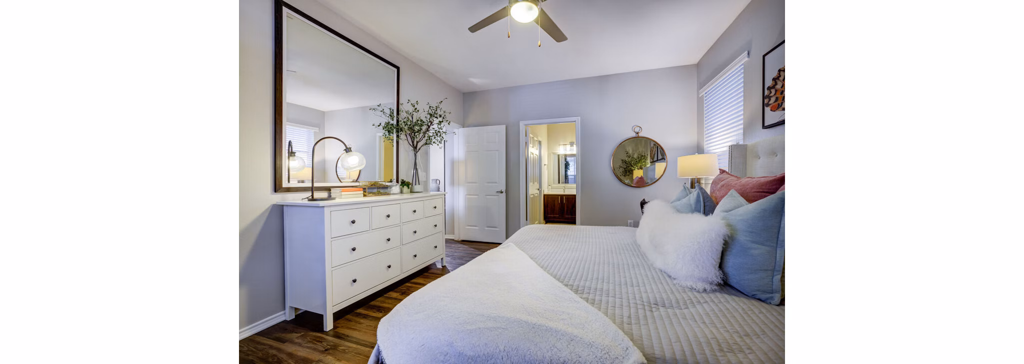 Modern bedroom with elegant decor at The Preserve at Travis Creek Apartments