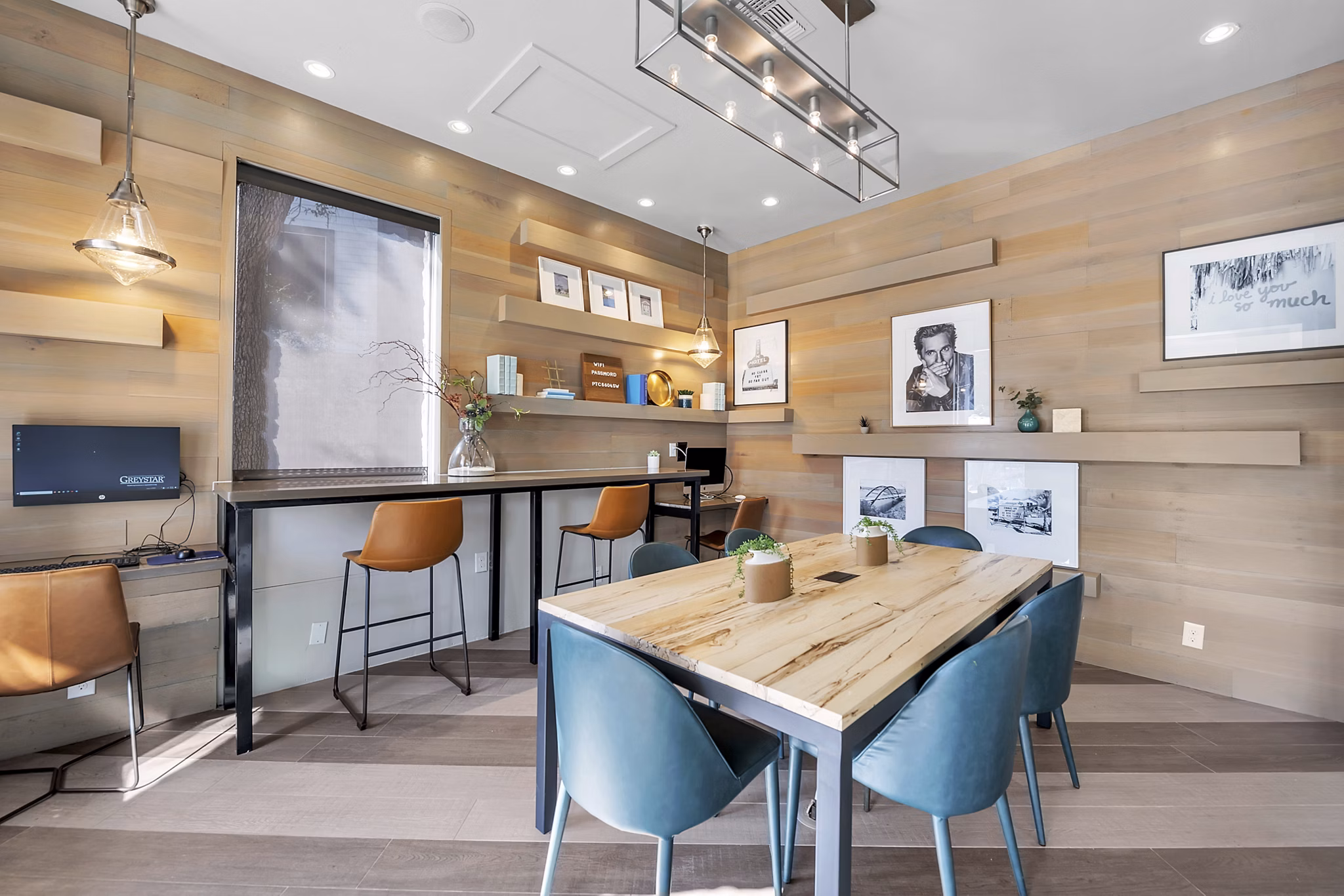 Modern clubhouse with lounge seating at The Preserve at Travis Creek Apartments