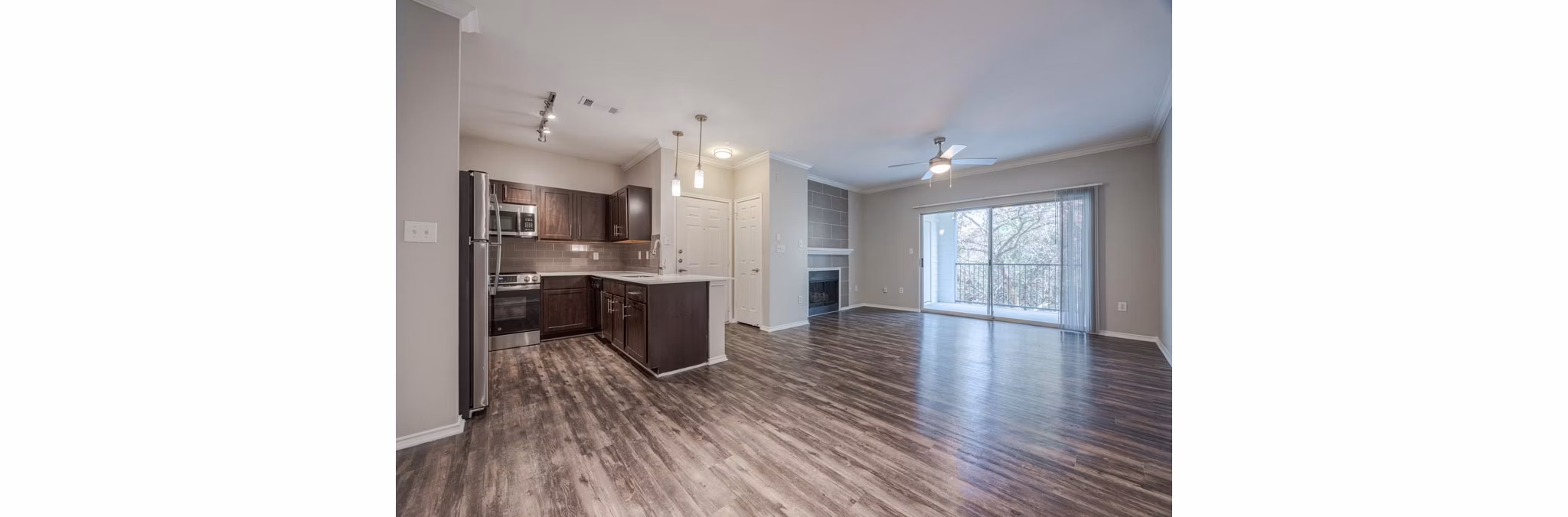 Clubhouse featuring modern design and seating areas at The Preserve at Travis Creek Apartments