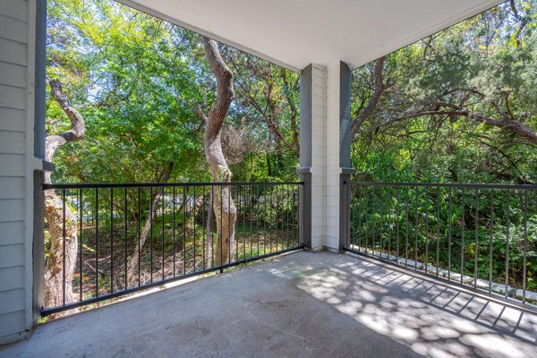 Spacious outdoor patio with stylish seating at The Preserve at Travis Creek Apartments, perfect for relaxation and entertaining