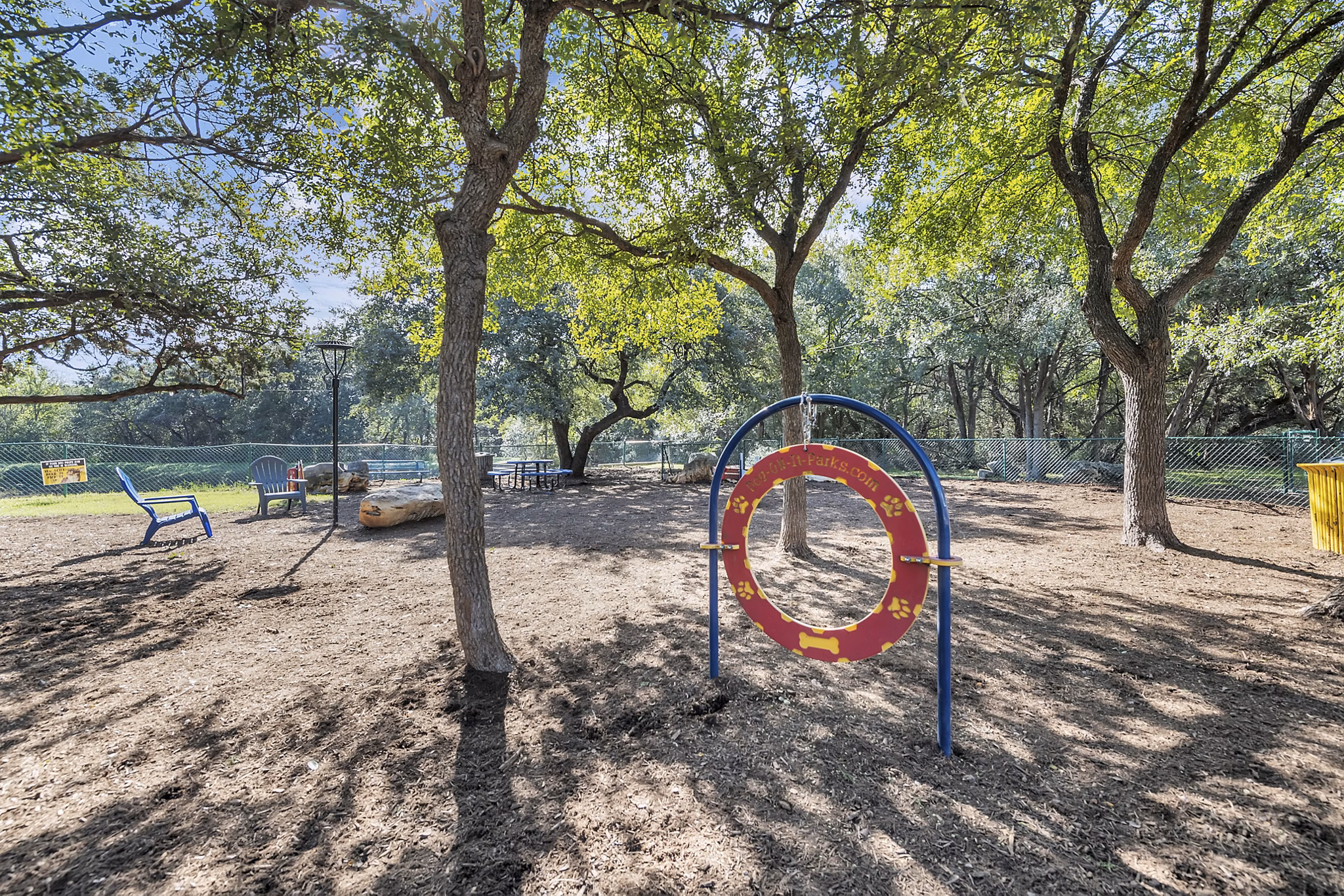 The Preserve at Travis Creek: Spacious dog park with agility equipment for apartment residents