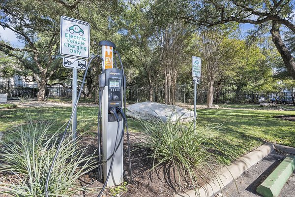 Eco-friendly car charging station at The Preserve at Travis Creek Apartments, enhancing sustainable living options for residents