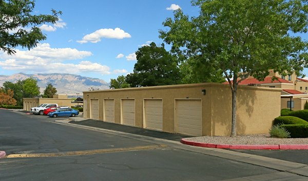 Covered parking garage at Odyssey Landing Apartments offering secure vehicle storage and convenient access