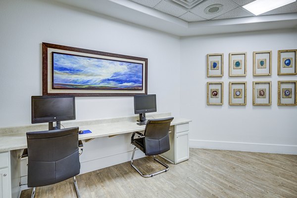 Clubhouse business center with modern workstations at Destinations Alexander Apartments: Luxury apartment amenities in Las Vegas