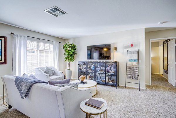 Modern living room with stylish decor at Destinations Alexander Apartments