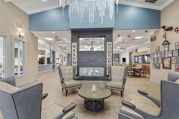 Clubhouse featuring modern decor and seating areas at Destinations Pebble Apartments