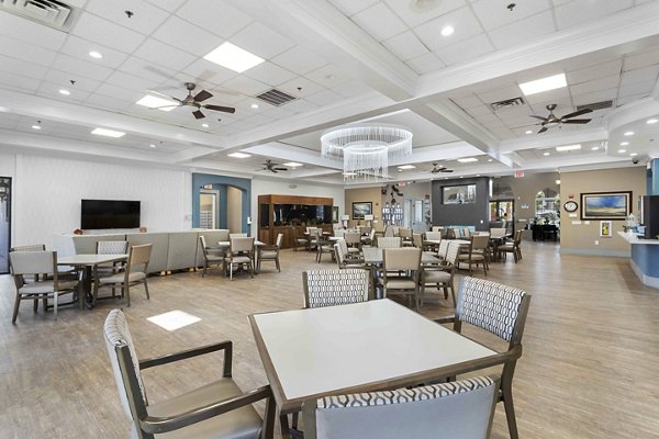 Clubhouse with modern design and entertainment facilities at Destinations Pebble Apartments