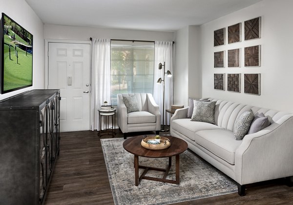 Living room with stylish decor at Destinations Pueblo Apartment Homes, offering luxurious Greystar living