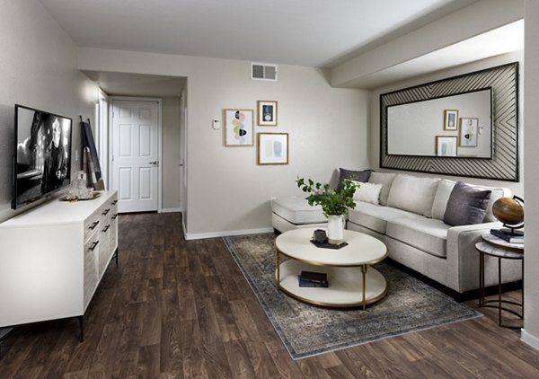 Spacious living room with modern decor in Destinations Spring Valley Apartment Homes
