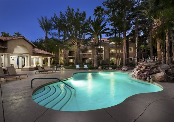 Resort-style pool at Destinations Spring Valley Apartment Homes offering luxurious relaxation in prime location