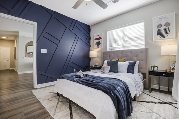 Bedroom at Avana Lake Norman: Modern design with sleek furniture and neutral tones in luxury apartments