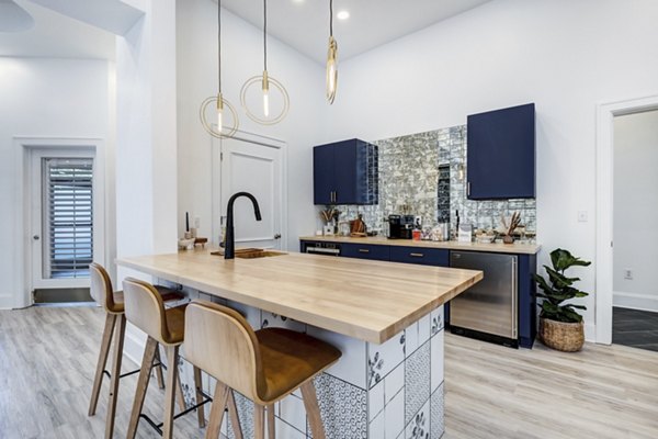 Spacious clubhouse with modern decor at Avana Lake Norman Apartments, perfect for social gatherings and events