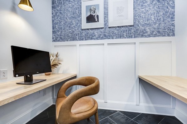 Business center with modern workstations at Avana Lake Norman Apartments