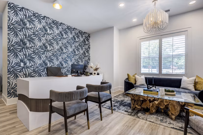 Clubhouse featuring modern furniture and vibrant decor at Avana Lake Norman Apartments