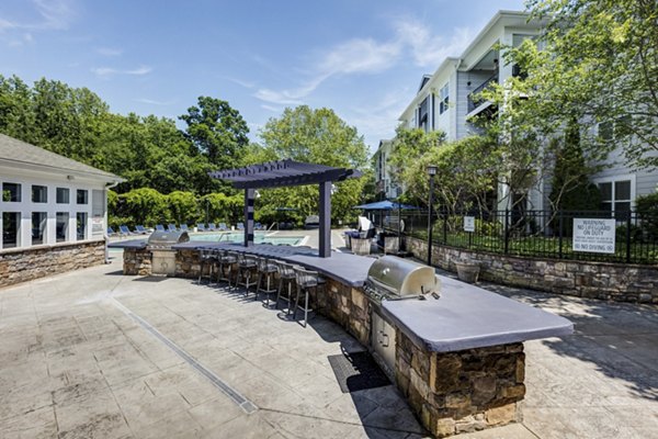 Outdoor BBQ grill area at Avana Lake Norman Apartments, perfect for social gatherings and relaxation