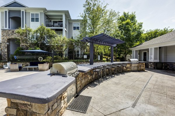 Grill area with modern seating at Avana Lake Norman Apartments