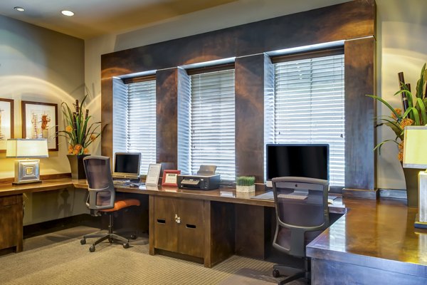 Clubhouse featuring a spacious lounge with modern decor at Estates at Memorial Heights Apartments