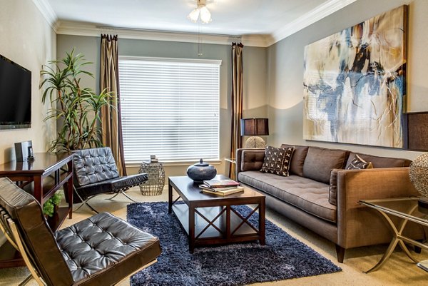 Spacious living room with modern decor at Estates at Memorial Heights Apartments
