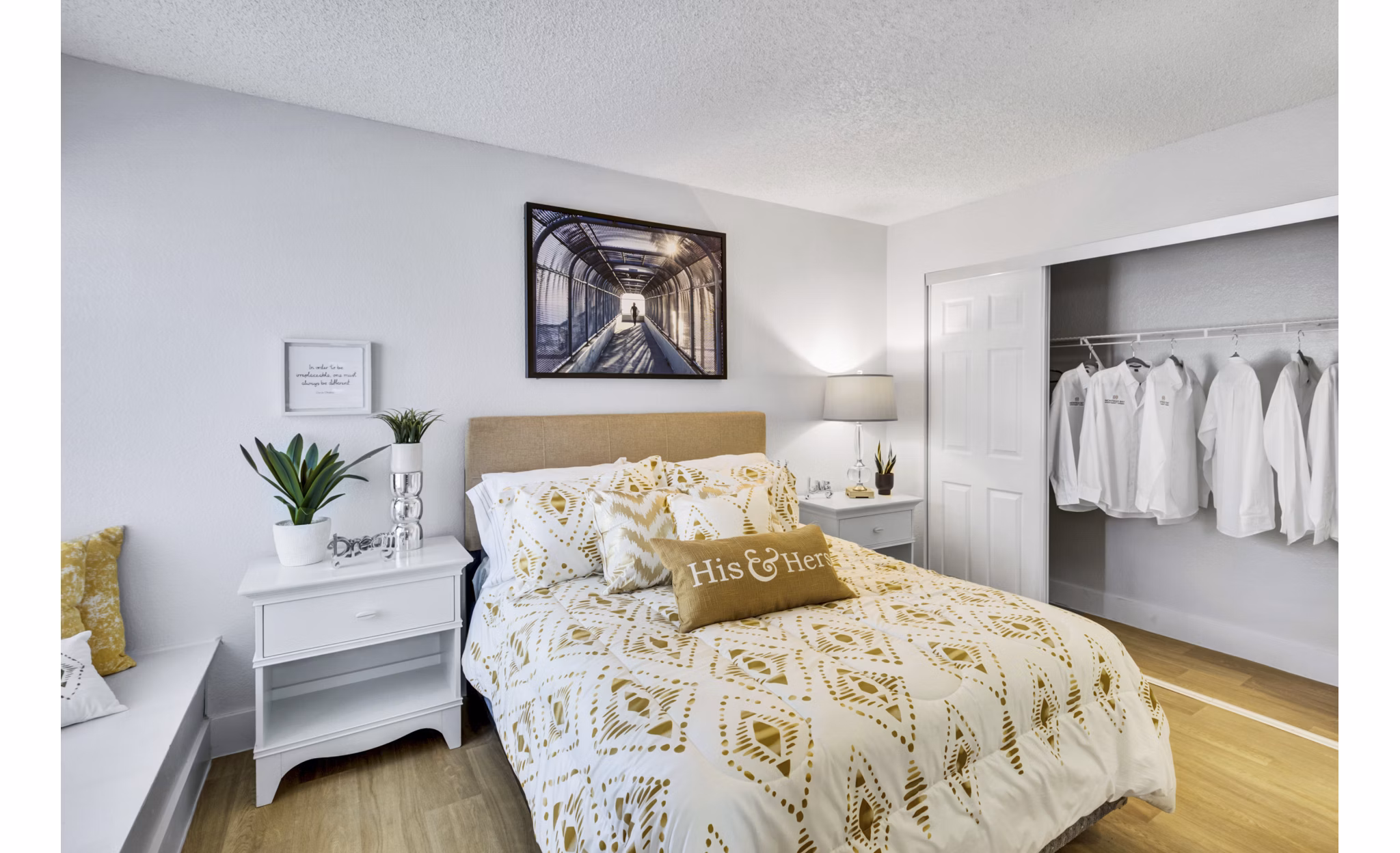 Spacious bedroom with modern furnishings at Montego Bay Apartments, offering comfort and style in a luxury setting