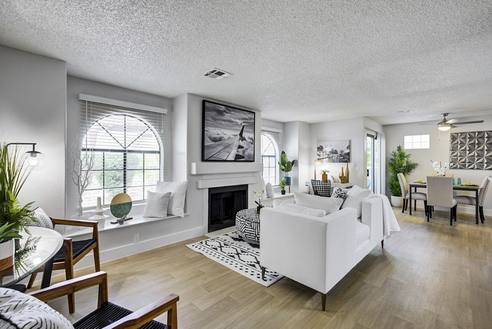 Contemporary living room with stylish decor and spacious layout at Montego Bay Apartments