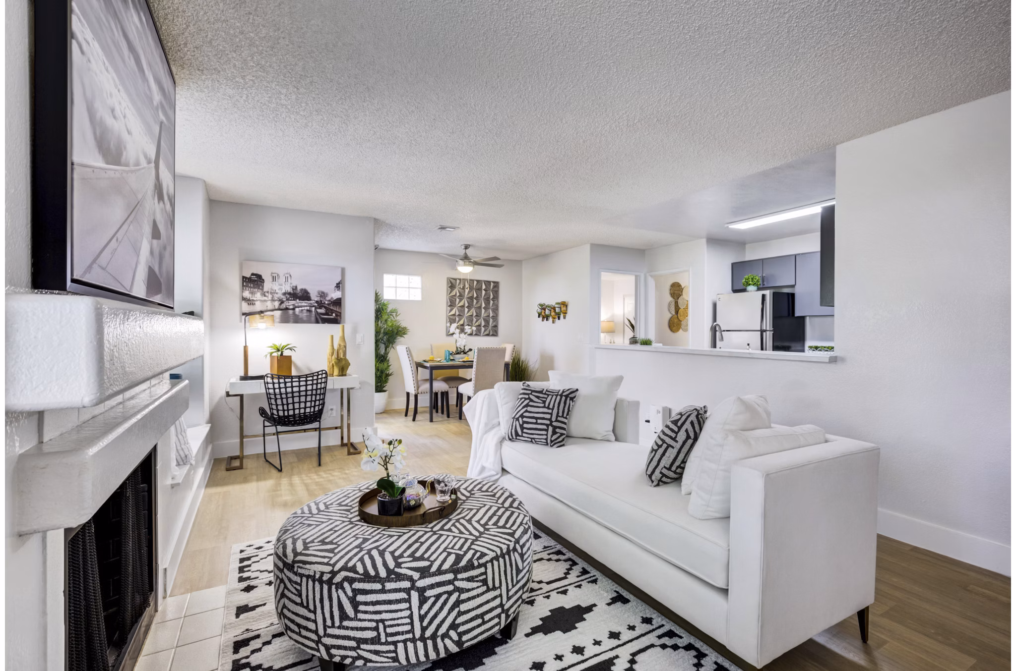Living room at Montego Bay Apartments with modern decor and ample natural light, perfect for luxury living