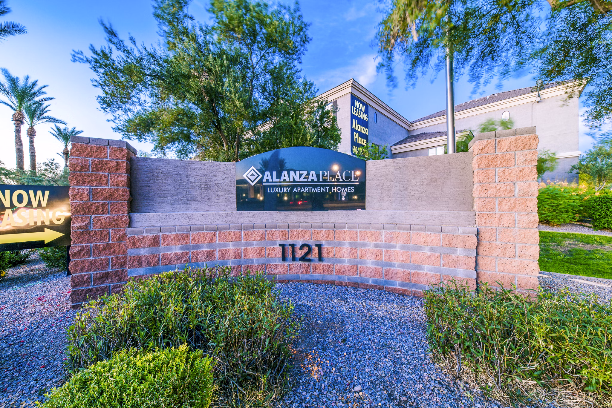 Alanza Place: Elegant sign for luxury apartments at 1121 in a modern community setting