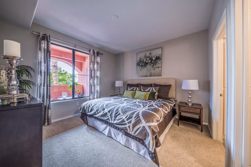 Cozy bedroom with stylish decor at Alanza Place Apartments