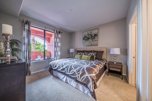 Cozy bedroom with stylish decor at Alanza Place Apartments