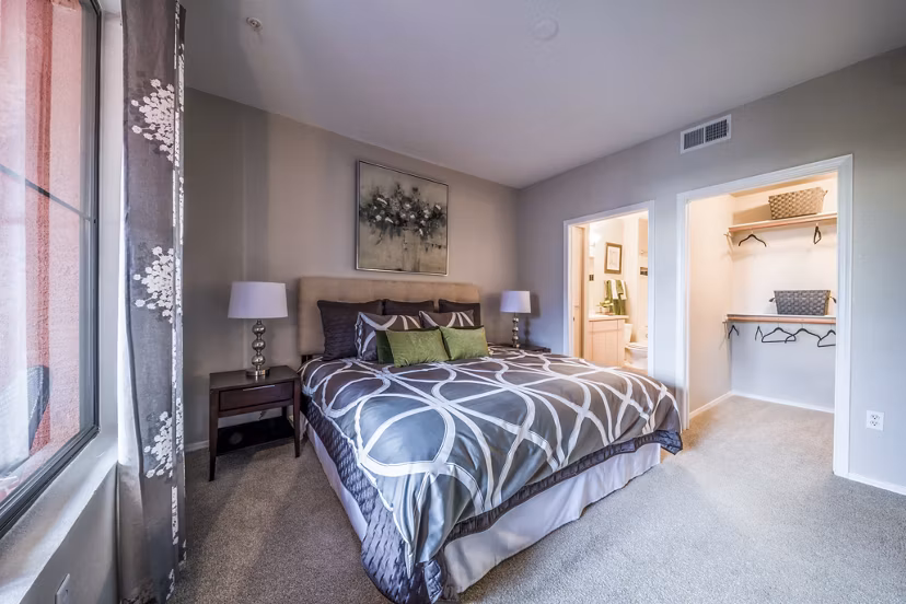 Cozy bedroom with modern decor at Alanza Place Apartments