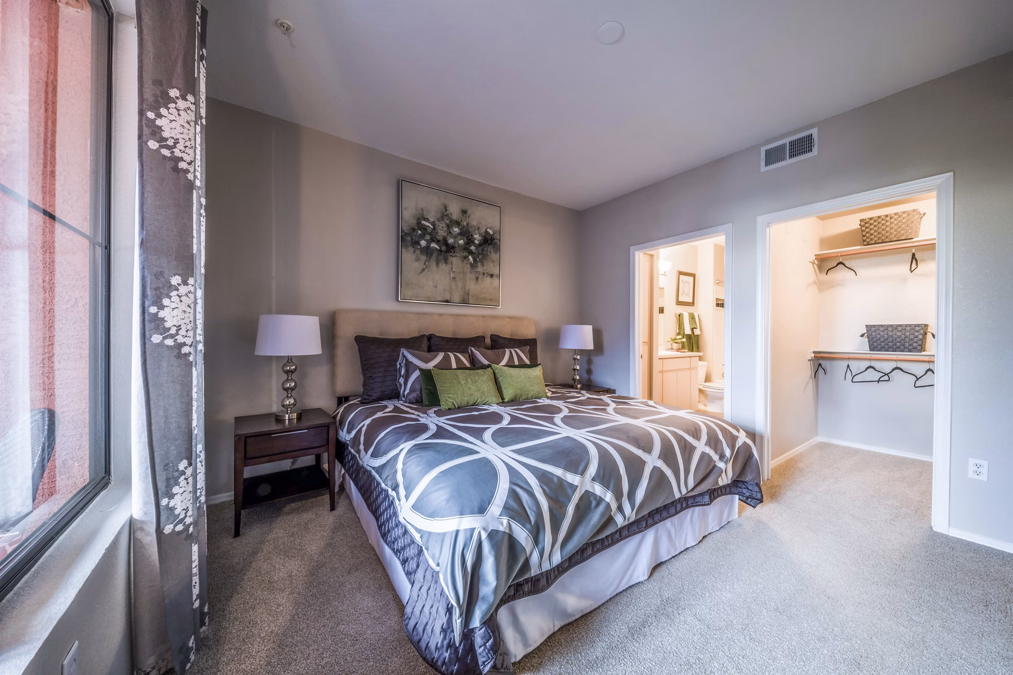 Cozy bedroom with modern decor at Alanza Place Apartments