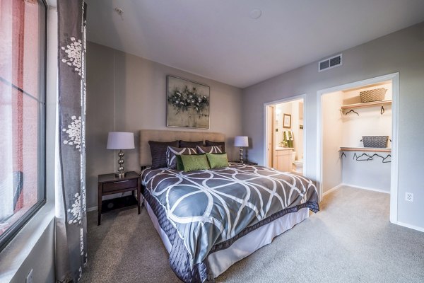 Cozy bedroom with modern decor at Alanza Place Apartments