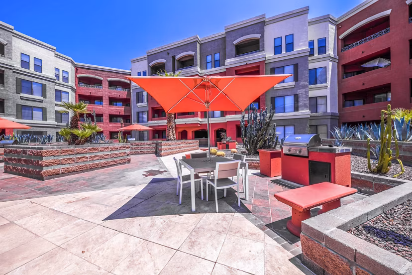 Spacious grill area with modern amenities at Alanza Place Apartments, perfect for outdoor cooking and gatherings