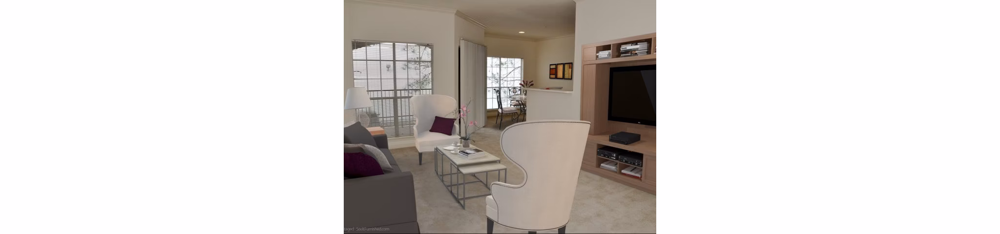Spacious living room with contemporary decor in The Boulevard Apartments