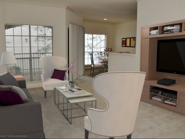 Spacious living room with contemporary decor in The Boulevard Apartments