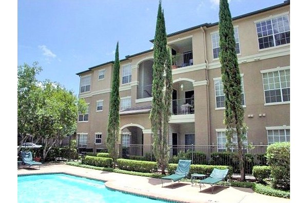 Serene outdoor pool area at The Boulevard Apartments, perfect for relaxation and recreation in a luxury setting