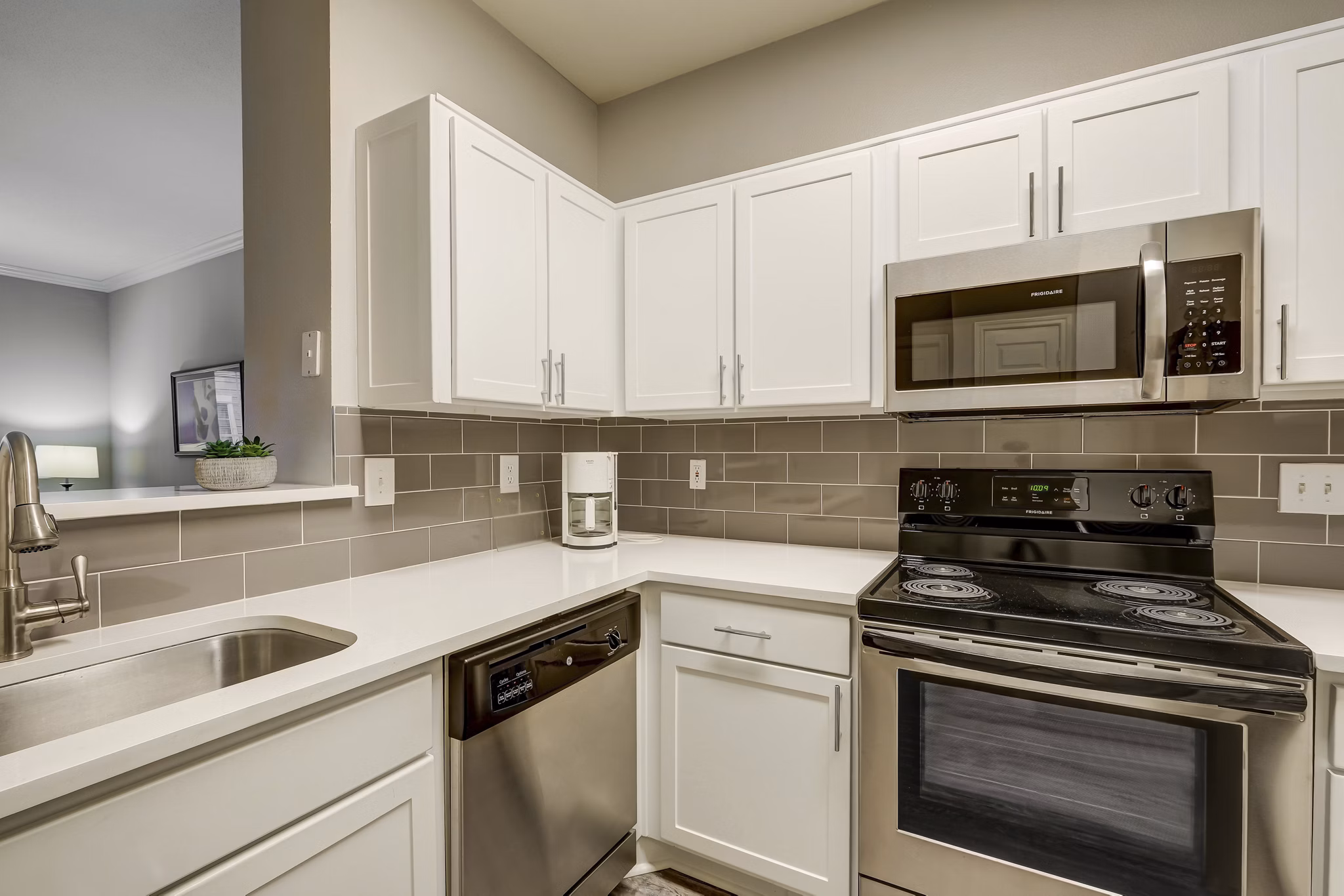 Kitchen at Plaza at River Oaks Apartments