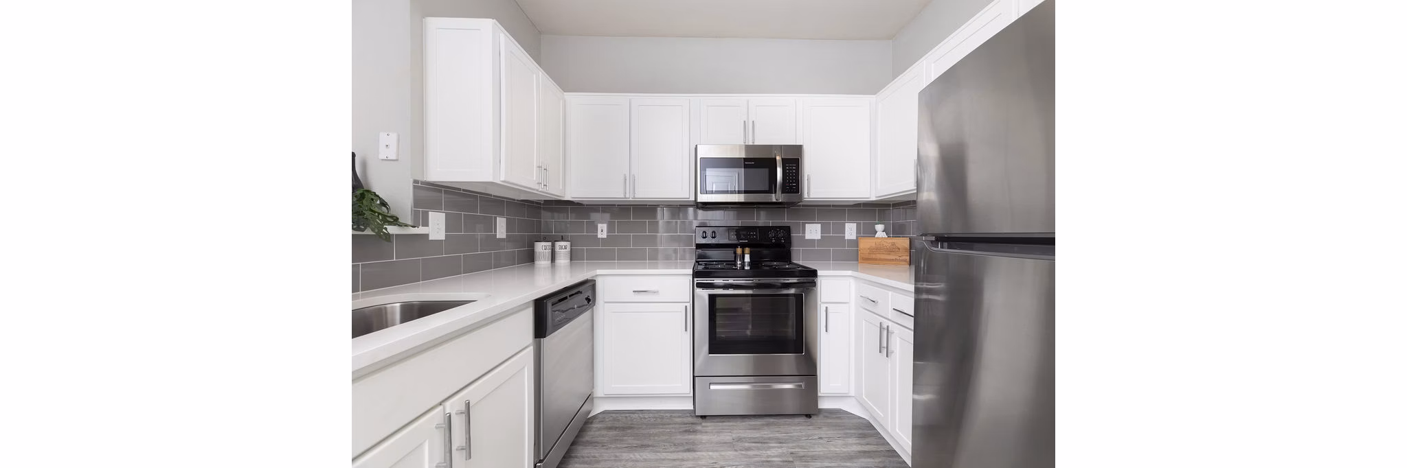 Kitchen at Plaza at River Oaks Apartments