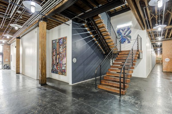 Modern clubhouse at Mitchell Lofts featuring sleek furnishings and open design