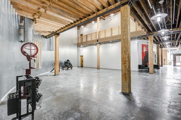 Stylish clubhouse interior with modern furnishings at Mitchell Lofts