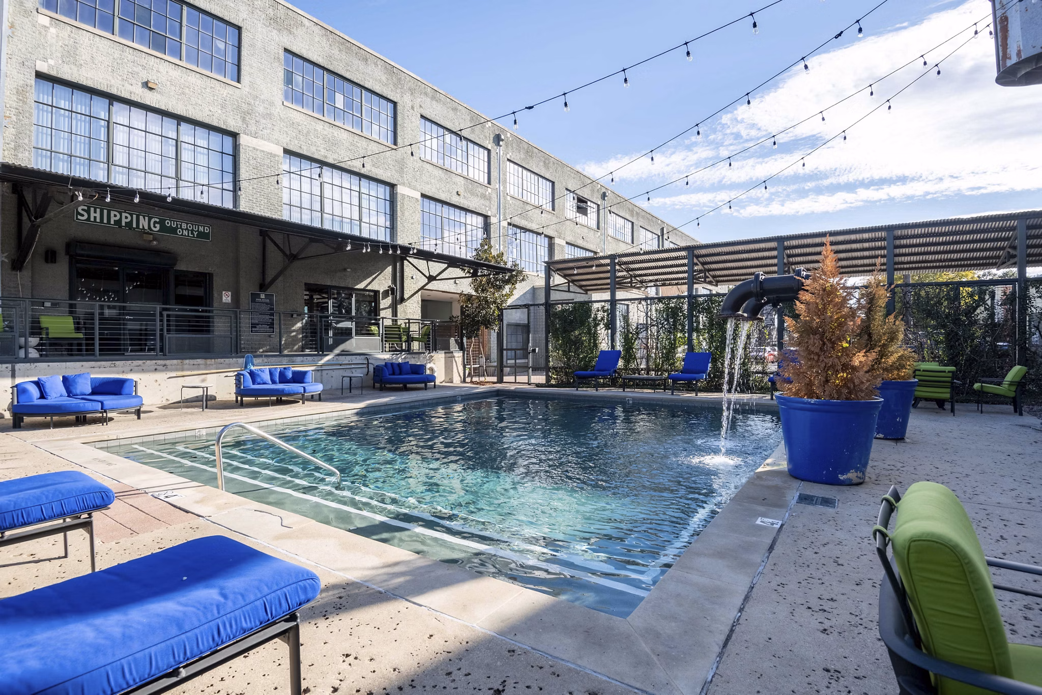 Rooftop pool with city skyline view at Mitchell Lofts, luxury apartments